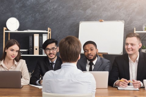 human resources team hiring a man