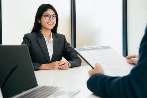 interviewer assessing woman's work experience