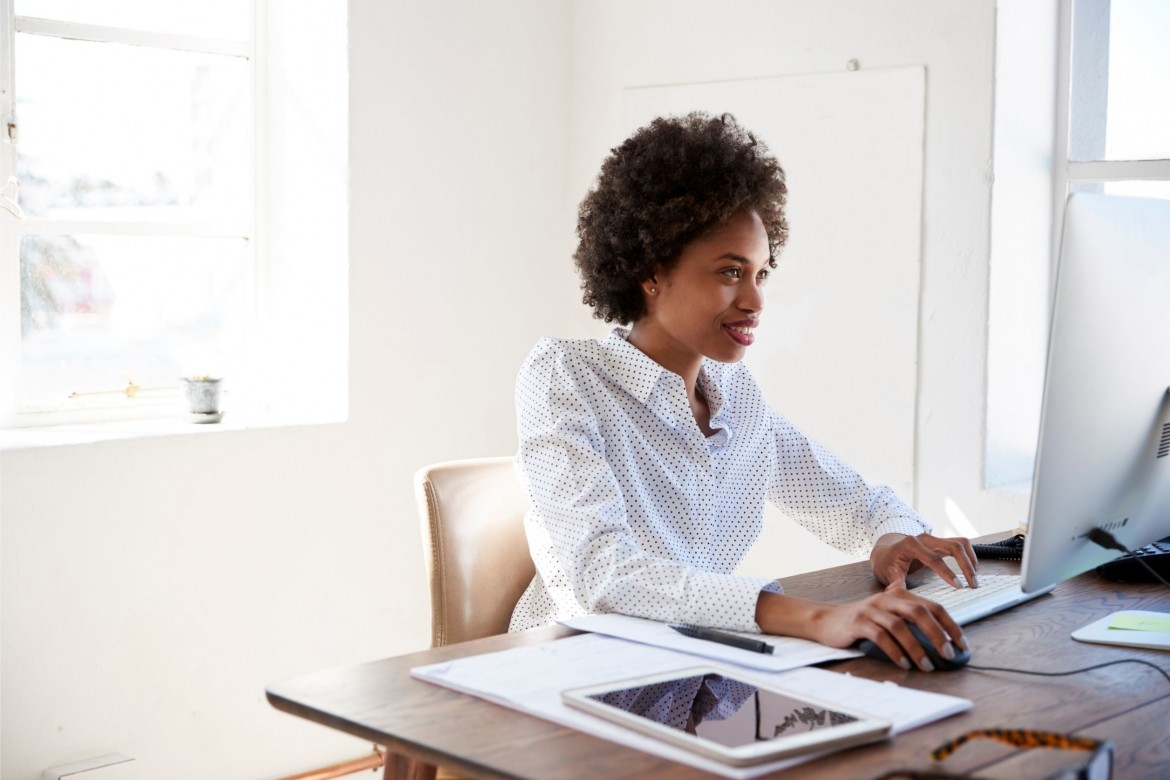 HR manager working in a computer on her office